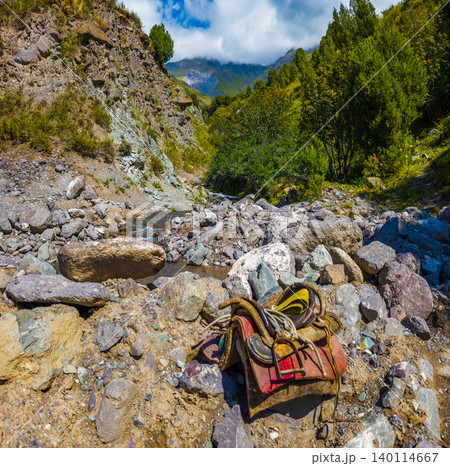 Traditional Saddle on Rocky Riverbed in Kyrgyzstan 140114667