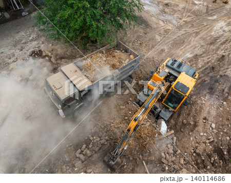 Aerial View of Construction Site with Excavator and Dump Truck Aerial View of Construction Site with Excavator and Dump Truck 140114686