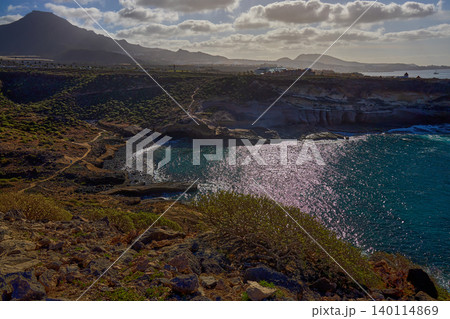 Sunny Volcanic Coastline with Cliffs and Ocean Bay Sunny Volcanic Coastline with Cliffs and Ocean Bay 140114869