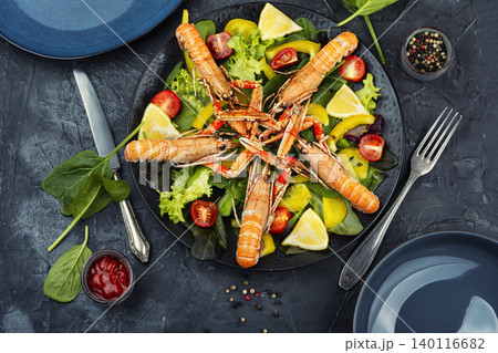 Gourmet Seafood Salad with Langoustines on Green Background, Flat lay. Gourmet Seafood Salad with Langoustines on Green Background, Flat lay. 140116682