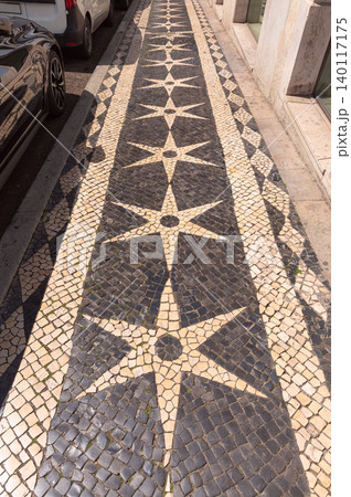 Traditional Black and White Pavement Pattern on Sidewalk in Lisbon Portugal 140117175