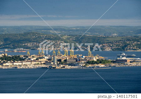 Aerial View Of Trieste City Harbour From Napoleonica Hiking Trail - Famous Climbing Bouldering Area, Gulf Of Trieste Adriatic Italy, Panoramic Karst Hillside Overlook Aerial View Of Trieste City Harbour From Napoleonica Hiking Trail - Famous Climbing Bouldering Area, Gulf Of Trieste Adriatic Italy, Panoramic Karst Hillside Overlook 140117501