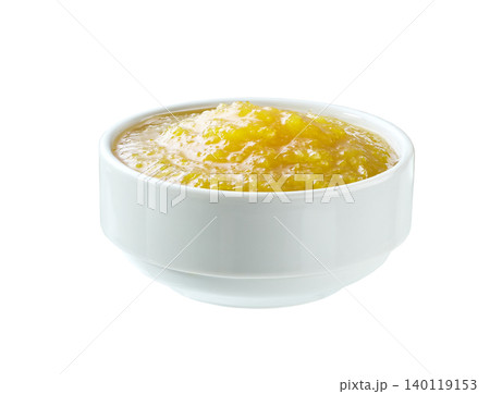 Lemon jam in a white ceramic bowl isolated on white background. Lemon jam in a white ceramic bowl isolated on white background. 140119153