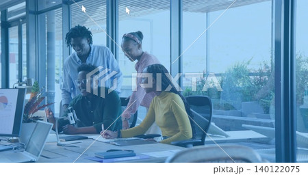 Collaborating team in smart-casual attire studying laptop and chart at glass office with tripod Collaborating team in smart-casual attire studying laptop and chart at glass office with tripod 140122075