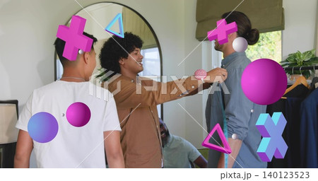 Reaching man in brown coat adjusting blue-shirt collar at home with mirror rack 3D overlays Reaching man in brown coat adjusting blue-shirt collar at home with mirror rack 3D overlays 140123523