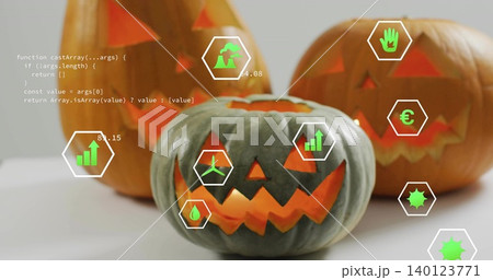 Displaying greenish-gray pumpkin glowing on table hex HUD icons floating orange pumpkins code text 140123771