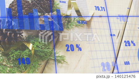 Displaying pine cones, evergreen sprigs, gold ribbon on light wood table, showing blue data labels 140125476
