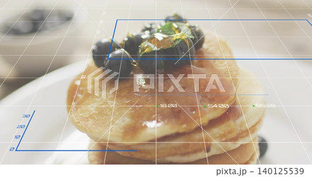 Showing pancake stack shining with syrup on white plate, with blueberries and nuts, grid and labels Showing pancake stack shining with syrup on white plate, with blueberries and nuts, grid and labels 140125539