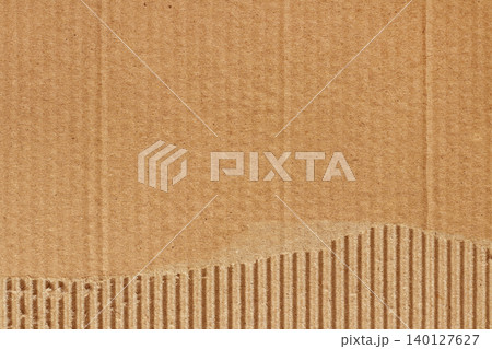 Brown cardboard sheet abstract background, texture of recycle paper box in old vintage pattern with ripped edges. Brown cardboard sheet abstract background, texture of recycle paper box in old vintage pattern with ripped edges. 140127627