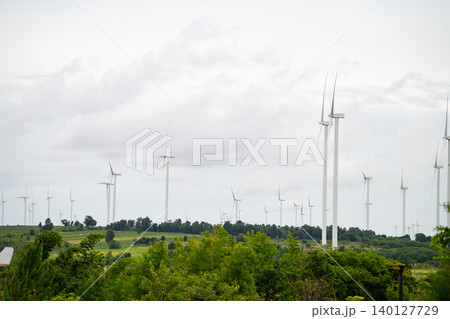 Wind energy. Wind power. Sustainable, renewable energy. Wind turbines generate electricity. Wind farm. Sustainable resources. Sustainable development. Green technology for energy sustainability. Wind energy. Wind power. Sustainable, renewable energy. Wind turbines generate electricity. Wind farm. Sustainable resources. Sustainable development. Green technology for energy sustainability. 140127729