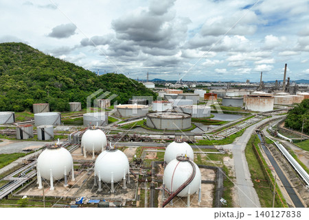 Industrial gas storage tank. LNG or liquefied natural gas storage tank. Gas tank in petroleum refinery. Natural gas storage industry. Energy infrastructure and petroleum reserves in global market. Industrial gas storage tank. LNG or liquefied natural gas storage tank. Gas tank in petroleum refinery. Natural gas storage industry. Energy infrastructure and petroleum reserves in global market. 140127838