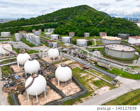 Industrial gas storage tank. LNG or liquefied natural gas storage tank. Gas tank in petroleum refinery. Natural gas storage industry. Energy infrastructure and petroleum reserves in global market. 140127839