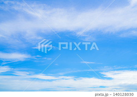 Blue sky and white cirrocumulus clouds texture background. Blue sky on sunny day. Summer sky. Cloud formation. Fluffy clouds. Nice weather in summer season. Weather pattern. Atmospheric phenomenon. Blue sky and white cirrocumulus clouds texture background. Blue sky on sunny day. Summer sky. Cloud formation. Fluffy clouds. Nice weather in summer season. Weather pattern. Atmospheric phenomenon. 140128030