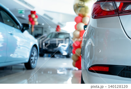 Car parked in luxury showroom. Car dealership office. Car showroom business. New car parked in modern showroom. Auto for sale and rent business. Automobile leasing and insurance. Electric automobile. Car parked in luxury showroom. Car dealership office. Car showroom business. New car parked in modern showroom. Auto for sale and rent business. Automobile leasing and insurance. Electric automobile. 140128120