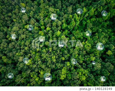 Carbon neutrality. Green trees capture emissions from factory and transportation. Environmental sustainability through carbon reduction. Climate change mitigation strategy using nature carbon capture. 140128149