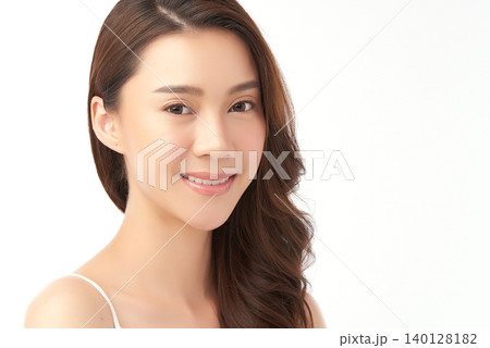 A beautiful young Asian woman with clean, fresh skin against a white background. Skincare, facial treatment, cosmetology, beauty, and spa. An elegant portrait of an Asian woman. A beautiful young Asian woman with clean, fresh skin against a white background. Skincare, facial treatment, cosmetology, beauty, and spa. An elegant portrait of an Asian woman. 140128182