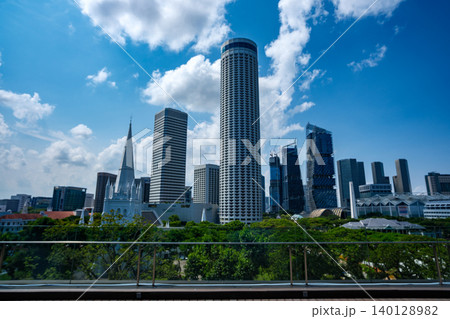 Singapore skyline with St. Andrew's Cathedral. It is an Anglican cathedral in Singapore, the country's largest cathedral. High quality photo 140128982