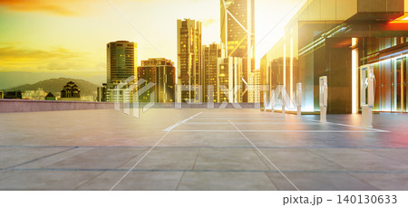 3d rendering rooftop ev charging station in modern city at sunset 140130633