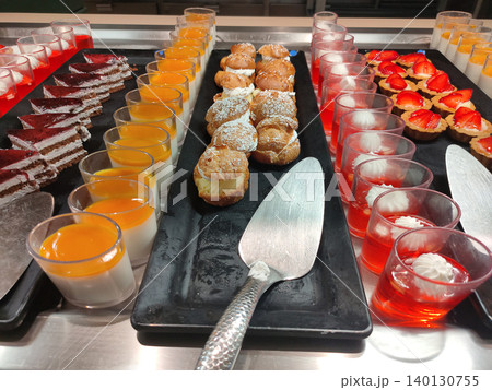 Dining Room Buffet aboard the abstract luxury cruise ship. Cakes 140130755