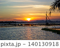 Beautiful Golden Sunset Over a Serene Lake with Water Reflections 140130918