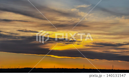 Golden Sunset Sky Above Dark Rural Horizon Golden Sunset Sky Above Dark Rural Horizon 140131547