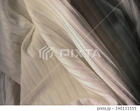 Iridescent White Fabric Texture With Soft Folds Iridescent White Fabric Texture With Soft Folds 140131555