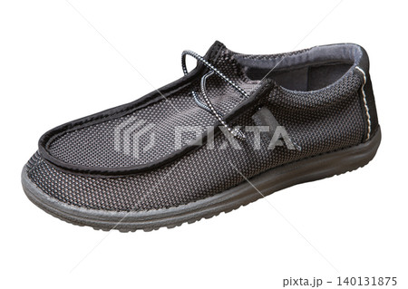 Men casual grey textile slip-on loafer shoe isolated on white background. Lightweight woven moccasin with elastic laces, side view. 140131875
