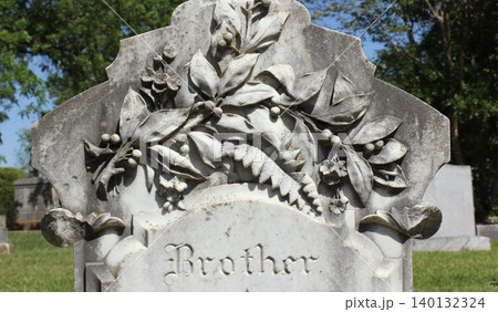 Close up of Historic Headstone With Floral Design in Rural East TX Cemetery Close up of Historic Headstone With Floral Design in Rural East TX Cemetery 140132324