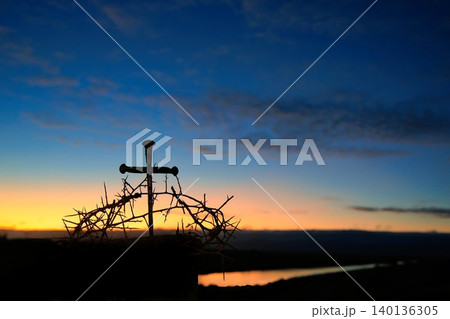 Crown of Thorns and Nails Cross with Dawn Sky 140136305