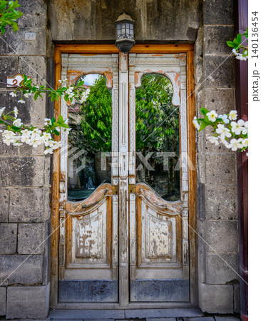 Old wooden doors with glass windows Old wooden doors with glass windows 140136454