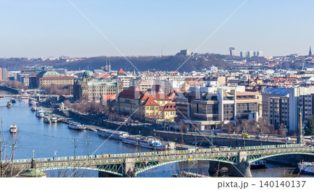 Aerial view of Prague cityscape with Vltava River, Legion Bridge and historic buildings in winter, Czech Republic 140140137