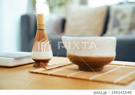 Traditional Matcha green tea set with bamboo whisk and bowl Traditional Matcha green tea set with bamboo whisk and bowl 140141540