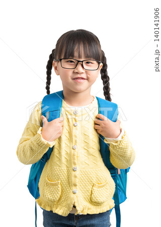 Cute Asian schoolgirl wearing glasses with backpack, smiling child isolated on white background, back to school concept 140141906