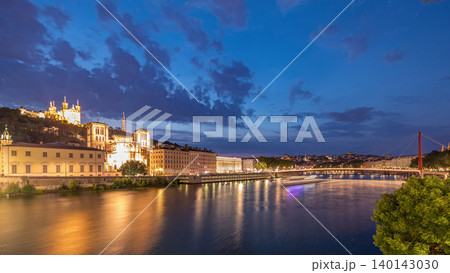 Timelapse of Saint John the Baptist Cathedral and Basilica of Notre-Dame de Fourviere in Lyon, from day to night. France Timelapse of Saint John the Baptist Cathedral and Basilica of Notre-Dame de Fourviere in Lyon, from day to night. France 140143030