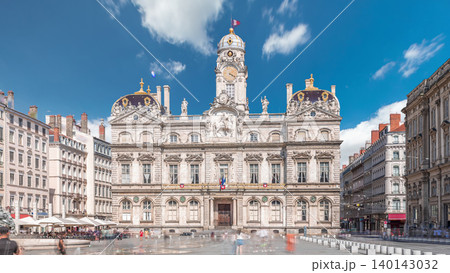 Hyperlapse of Hotel de Ville de Lyon, the historic city hall of Lyon, France. People stroll near the fountain on the square timelapse. 140143032