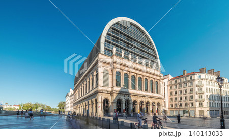 Hyperlapse of Lyon's opera house featuring neoclassical architecture combined with a modern glass dome roof. France Hyperlapse of Lyon's opera house featuring neoclassical architecture combined with a modern glass dome roof. France 140143033