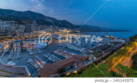 Panorama of Monte Carlo day to night timelapse from the observation deck in the village of Monaco with Port Hercules 140143073