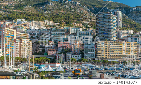 Monte Carlo Port Hercule panorama timelapse. View of luxury yachts and houses in Monaco, Cote d'Azur. Monte Carlo Port Hercule panorama timelapse. View of luxury yachts and houses in Monaco, Cote d'Azur. 140143077