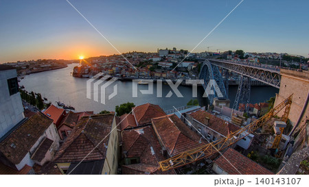 Panorama of old city Porto at river Duoro,with Port transporting boats at sunset timelapse, Oporto, Portugal Panorama of old city Porto at river Duoro,with Port transporting boats at sunset timelapse, Oporto, Portugal 140143107