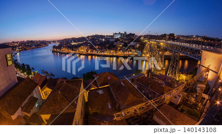 Panorama of old city Porto at river Duoro after sunset day to night timelapse, Oporto, Portugal 140143108