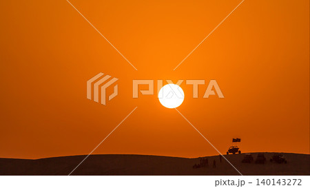 Buggies in sand desert at the sunset timelapse Buggies in sand desert at the sunset timelapse 140143272