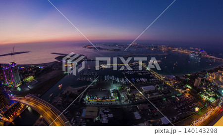 Aerial view from Dubai Marina panorama from day to night transition timelapse 140143298