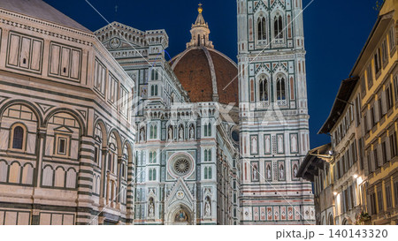 Facade and dome of The Basilica di Santa Maria del Fiore day to night timelapse which is the cathedral church Duomo of Florence in Italy Facade and dome of The Basilica di Santa Maria del Fiore day to night timelapse which is the cathedral church Duomo of Florence in Italy 140143320