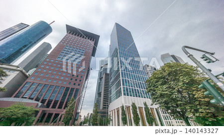 Hyperlapse looking up perspective at glass skyscrapers in Frankfurt's Innenstadt district. Germany 140143327
