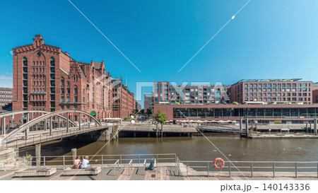 Panorama showing famous old Speicherstadt in Hamburg timelapse featuring the International Maritime Museum, Germany 140143336