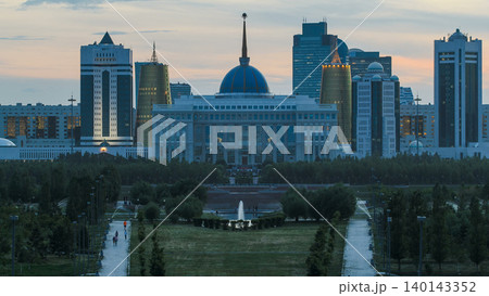 Close up view of Astana city day to night timelapse and the president's residence Akorda with park 140143352