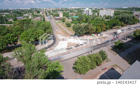 Road construction site with tram tracks repair and maintenance aerial timelapse. 140143417