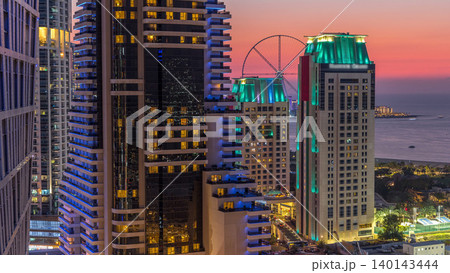 JBR and Bluewaters island after sunset aerial day to night timelapse JBR and Bluewaters island after sunset aerial day to night timelapse 140143444