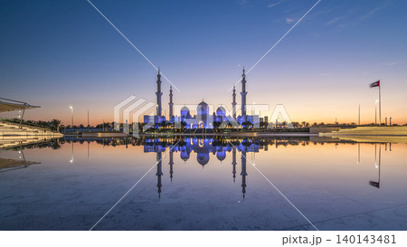 Sheikh Zayed Grand Mosque in Abu Dhabi day to night timelapse after sunset, UAE Sheikh Zayed Grand Mosque in Abu Dhabi day to night timelapse after sunset, UAE 140143481