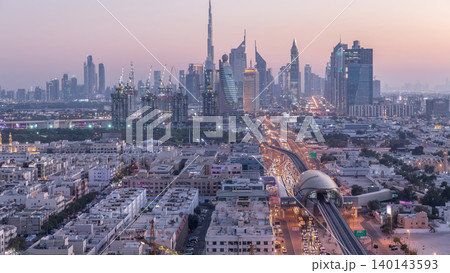 Dubai skyline after sunset with beautiful city center lights and Sheikh Zayed road traffic timelapse, Dubai, United Arab Emirates Dubai skyline after sunset with beautiful city center lights and Sheikh Zayed road traffic timelapse, Dubai, United Arab Emirates 140143593
